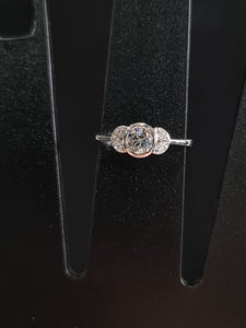 Ring with Center Round Diamond and Round White Diamond Side Stones | Fête Matrimony XXIV