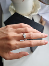 Load image into Gallery viewer, Ring with Center Round Diamond and Round White Diamond Side Stones | Fête Matrimony XXIV
