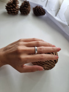 Engagement Ring with a Solitaire Round White Diamond Complimented by a Row of Smaller Round White Diamonds | Fête Jubilee XIII