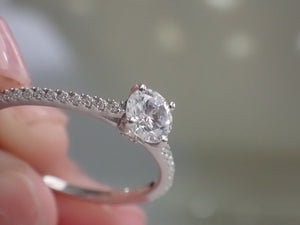 Engagement Ring with a Center Round White Diamond and Round White Diamond Side Stones | Fête Matrimony XXVI