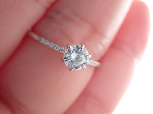 Classic Engagement Ring with a Center Round White Diamond and Round White Side Diamonds | Fête Matrimony XIII